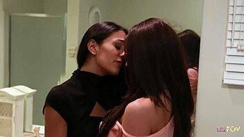 Cute indian girl admires her girlfriend's body and decides to please her gently in bed with soft touches.