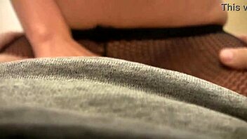 Girl in stockings masturbates with her boyfriend’s cock