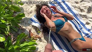 Pissed on Skinny Babe at Public Beach in Shock