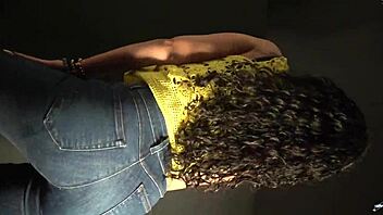 moving butt to music in sexy outfit with long nails