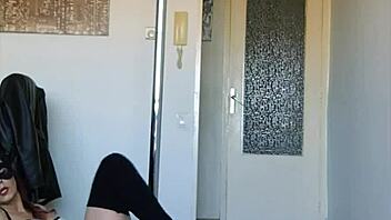 Amateur stripper dances seductively rubbing against bar