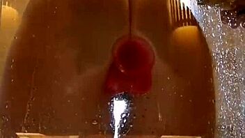 Girl with appetizing ass plays in shower with pink dildo. Clothes get ripped during homemade fun.