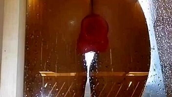 Girl with appetizing ass plays in shower with pink dildo. Clothes get ripped during homemade fun.