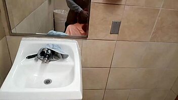 Pretty snow bunnies in outdoor homemade scene.