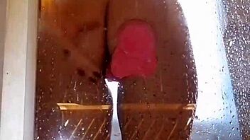 Girl with appetizing ass plays in shower with pink dildo. Clothes get ripped during homemade fun.