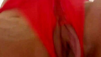 a latina woman masturbating alone