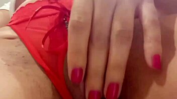 a latina woman masturbating alone