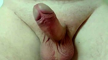 Nylonjunge’s hard shaft in slow motion close up.