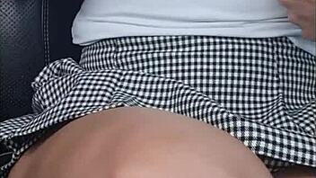 teasing boyfriend with toy in car