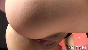 Young tranny eagerly swallows a thick penis with passion.