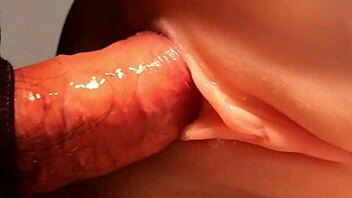 Sliding my cock into her shaved pussy from behind