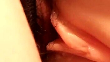 Sliding my cock into her shaved pussy from behind