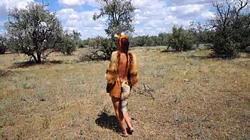 Savannah vixen enjoys outdoor fun with amateurs.