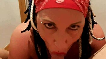 Mature woman with big tits deeply throats cock, soft yet hard.