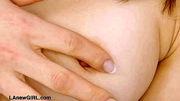 Fresh-faced fashion gem shows off her stunning figure on sofa