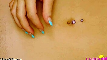 Cute blonde model flaunts sexy curves on sofa