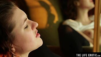 She masturbates in black stockings