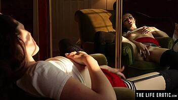 She masturbates in black stockings