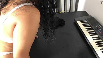 Can the curvy young woman in tight skirt handle hot keyboard lessons with ass shaking?