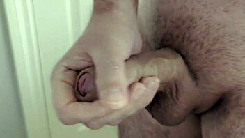 Slow motion cumshot captured in homemade bathroom clip