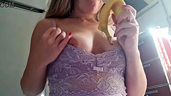I watch this hot babe masturbating in the kitchen with her natural tits exposed, it's so arousing