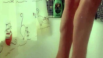 Busty teen washes perfect feet in shower