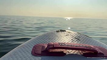 Milf does sup yoga with lush vibrator on water, cumming publicly