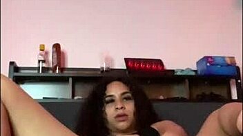 horny latina stretches and shakes her ass on the bed