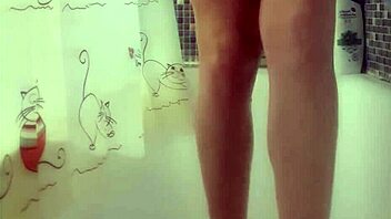 Busty teen washes perfect feet in shower