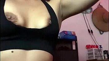 horny latina stretches and shakes her ass on the bed