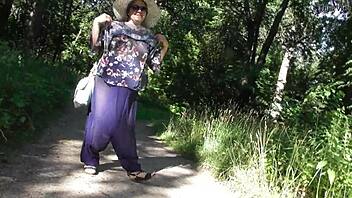 hairy mature lady flashes upskirt in public park with bold moves