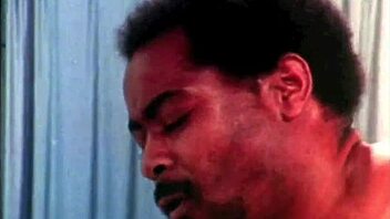 Vintage Dark London interracial pregnant threesome in swinging sixties shadows