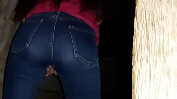 I caught a brunette stranger masturbating in jeans in an abandoned place, leading to her orgasm.