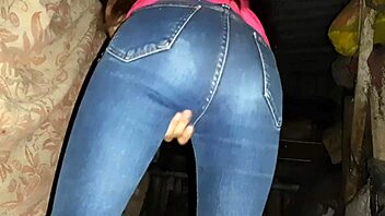 I caught a brunette stranger masturbating in jeans in an abandoned place, leading to her orgasm.