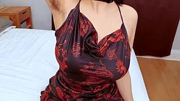 Hairy armpit striptease reveals soft skin under latex, teasing with slow undressing and clothes ripping.