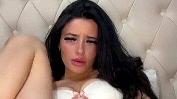 Slutty American exchange student fingers herself to orgasm in wild solo action.