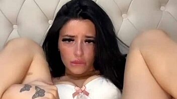 Slutty American exchange student fingers herself to orgasm in wild solo action.