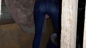 I caught a brunette stranger masturbating in jeans in an abandoned place, leading to her orgasm.