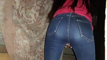 I caught a brunette stranger masturbating in jeans in an abandoned place, leading to her orgasm.