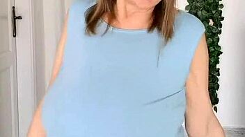 Busty braless gilf MariaOlds shows off sporty strip dancing with mature charm. Her moves captivate every viewer.