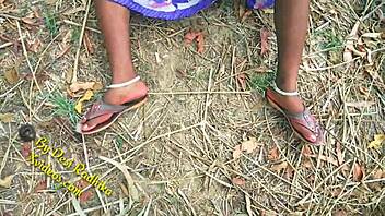 An Indian couple engaged in passionate sex right in the yard
