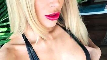 look at me in wetlook suit and shiny leather boots showing off