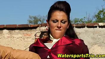 Outdoor threesome involves watersports and blowjobs