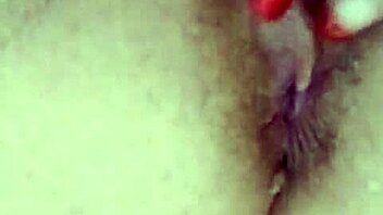 Fingers explore the wet vagina and clit.