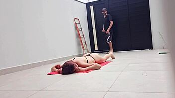 wife sunbathing in bikini while neighbor fixes gate