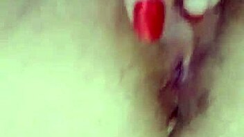 Fingers explore the wet vagina and clit.