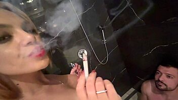 wife smoking while dealing with slave in bdsm session