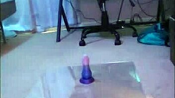 chubby femboy fists ass with dildo