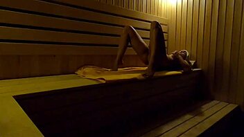 Hidden Camera Captures Teen Masturbating in Sauna at Night