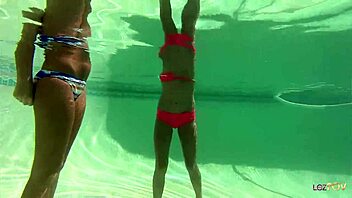 cute teens having fun in swimming pool